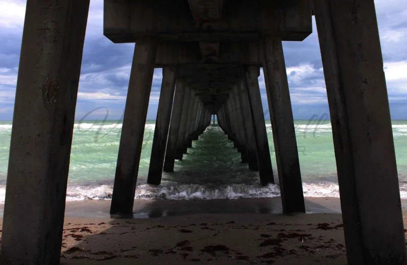 Turquoise Water Under The Pier Photo