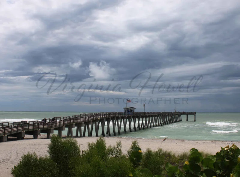 Clouds At The Pier Photo